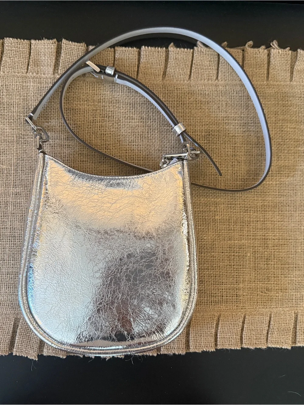 Kate Spade Kayla Small Swingpack Metallic Silver Leather Crossbody Bag. NWOT.